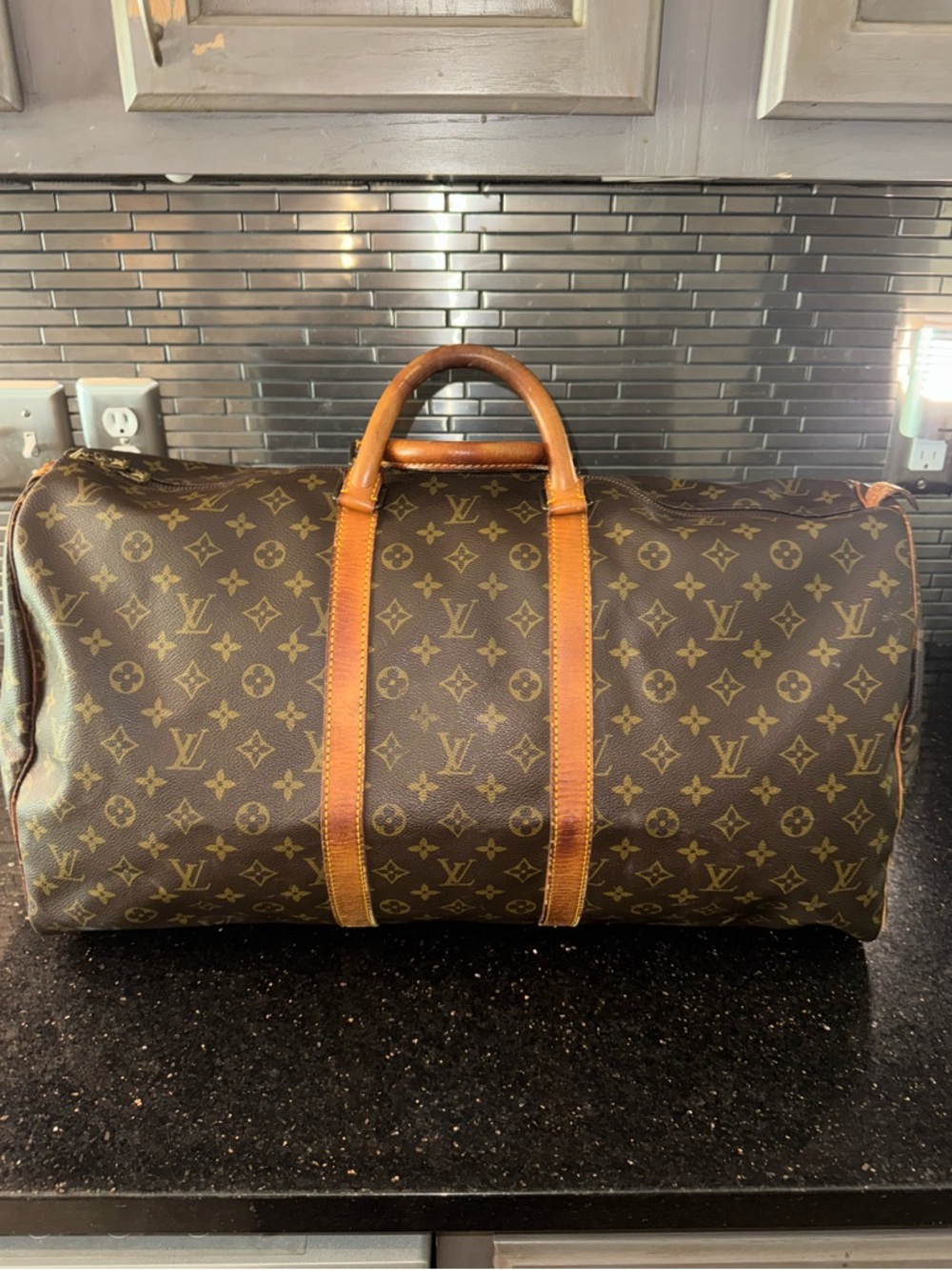 Louis Vuitton Keepall 50 Monogram Canvas Duffel Bag in Brown and Tan